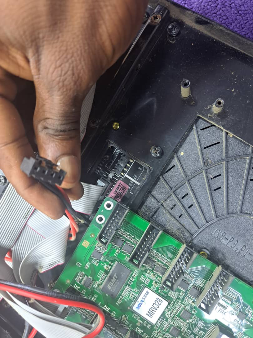 Technician servicing an LED module